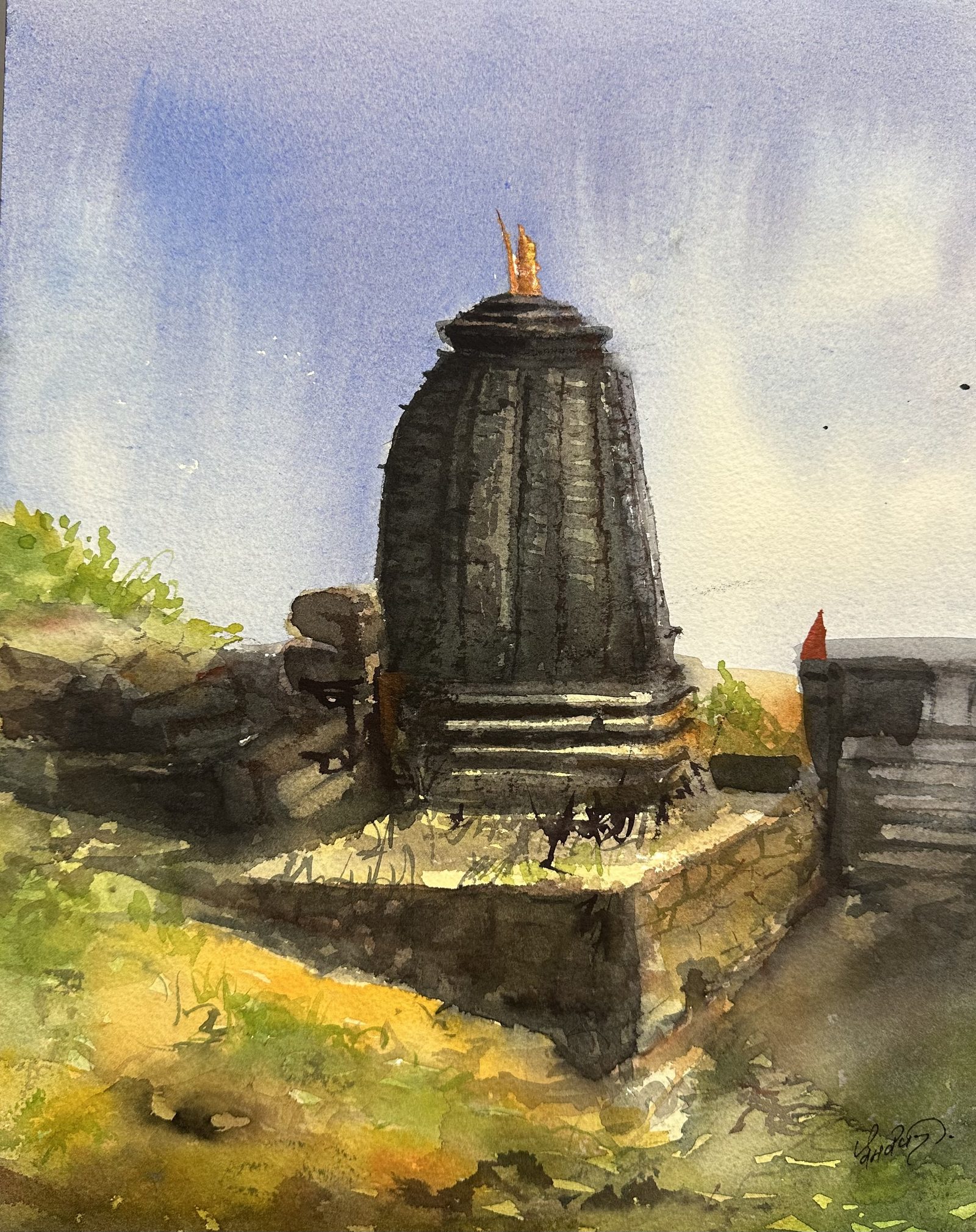 Black stone shrine against blue sky