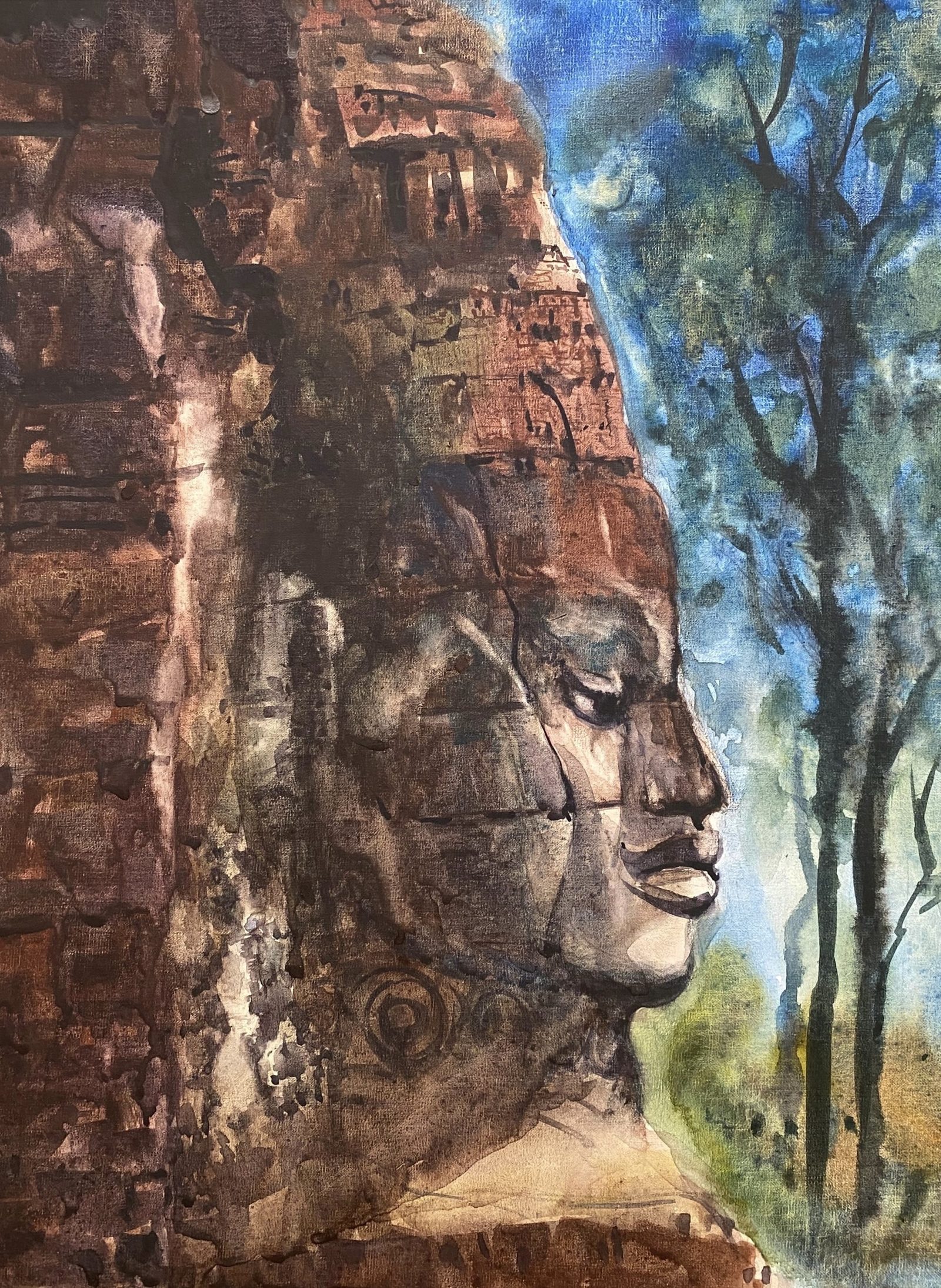 Bayon face profile among trees