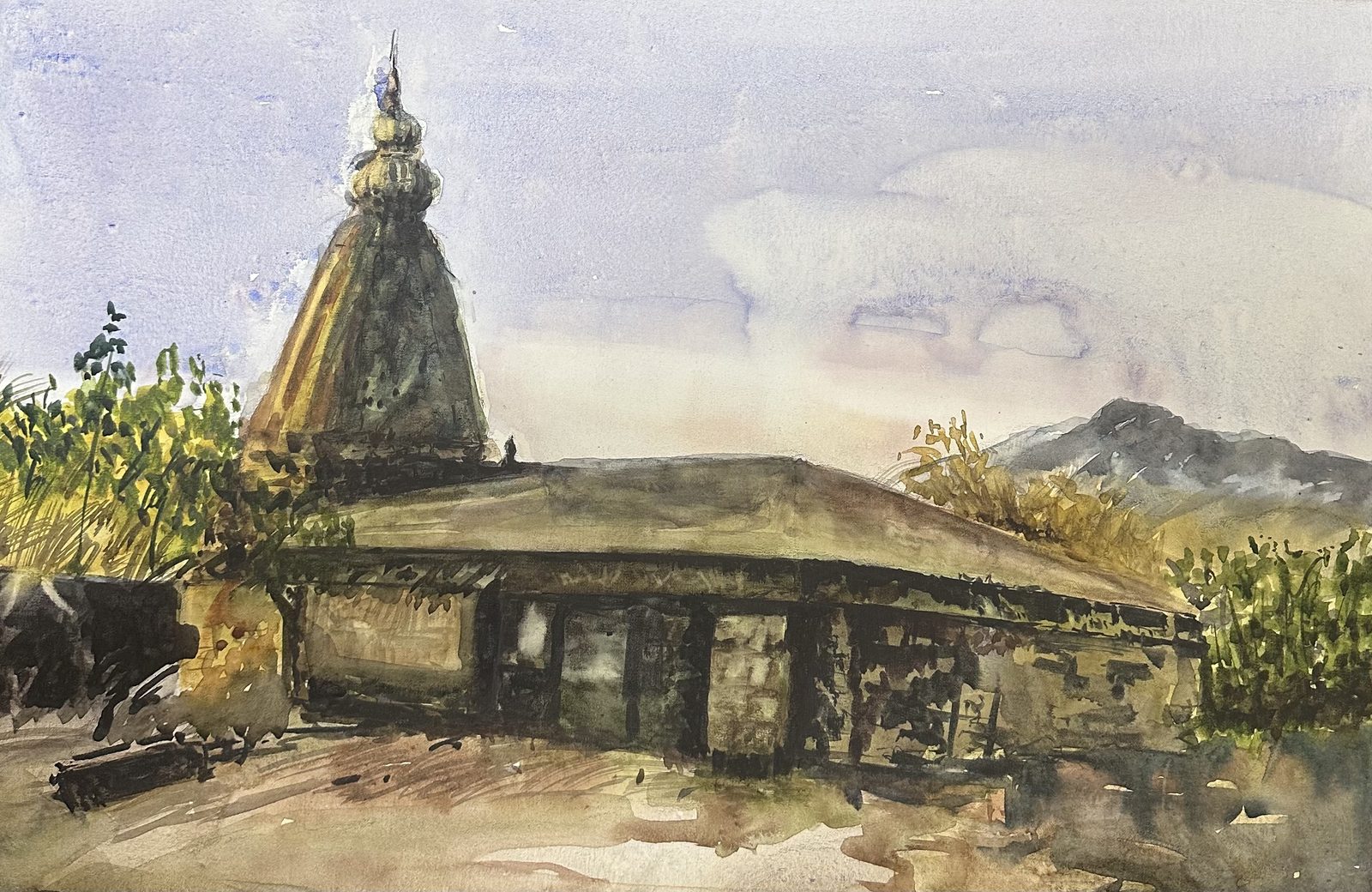 Temple spire with mountains behind