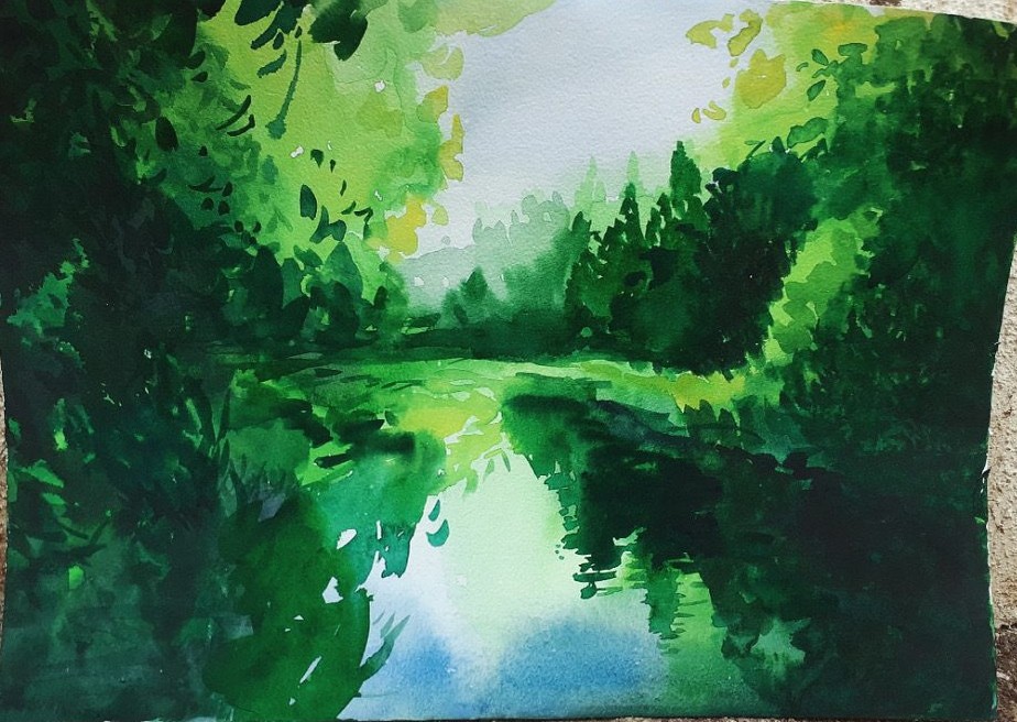 Green forest river reflection